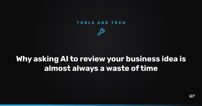 A business owner reviewing notes on a laptop while using an AI chat tool to test an idea